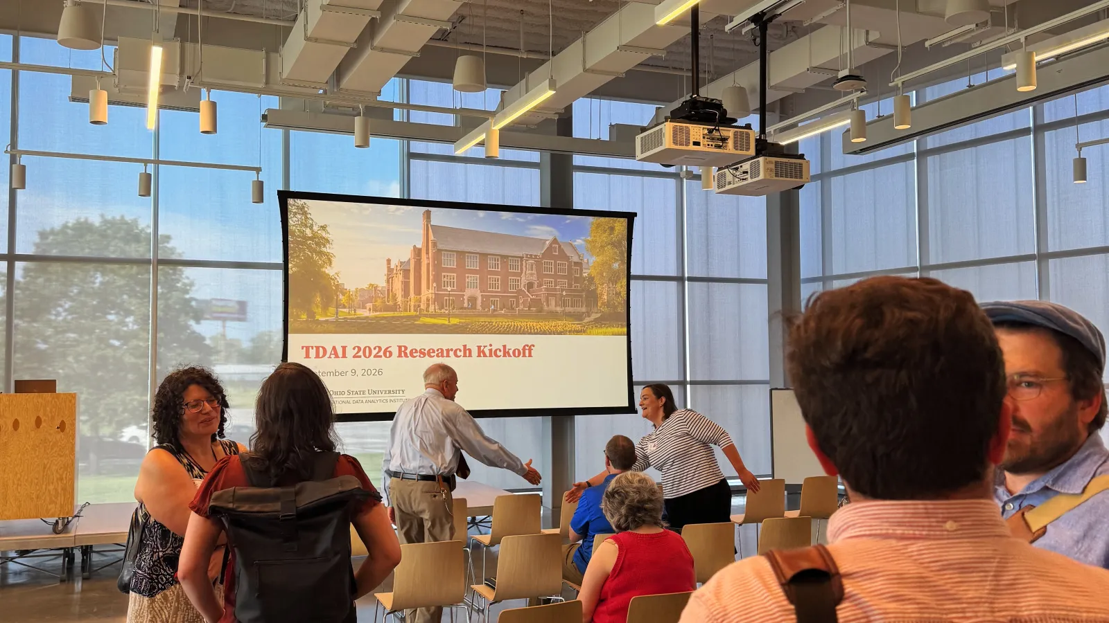 Attendees talk and network during the 2026 TDAI Fall Research Kickoff.