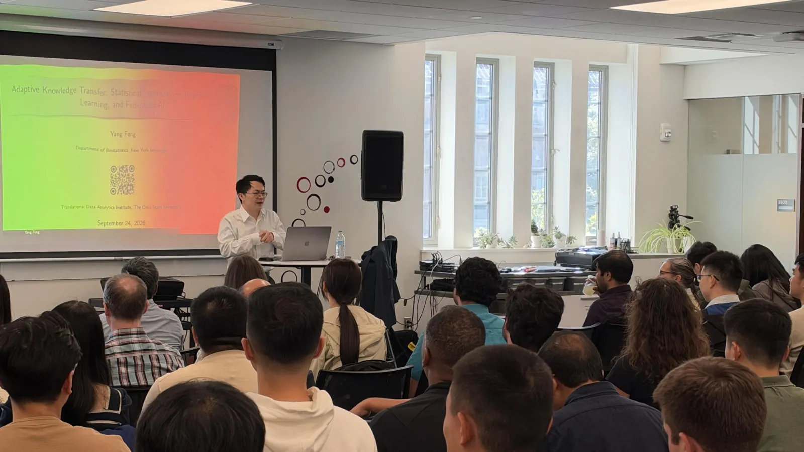 Yang Feng speaks to attendees during TDAI’s Adaptive Knowledge Transfer seminar in Pomerene Hall.
