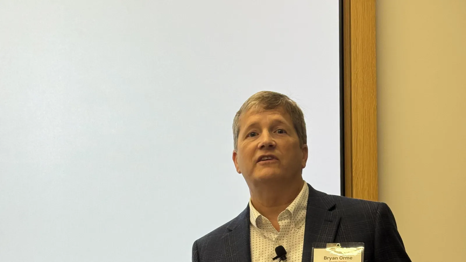 Keynote speaker Bryan Orme presents at TDAI’s symposium on AI and social measurement.