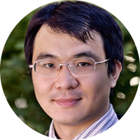 Headshot of Han Liu wearing glasses and a collared shirt, photographed outdoors.