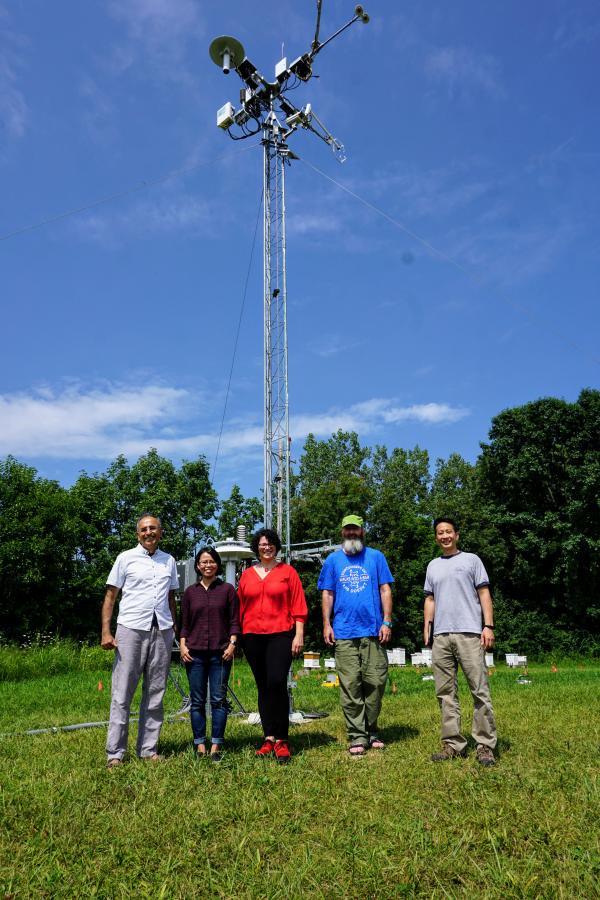 OSU faculty and staff at the NEON mobile unit at the OSU airport